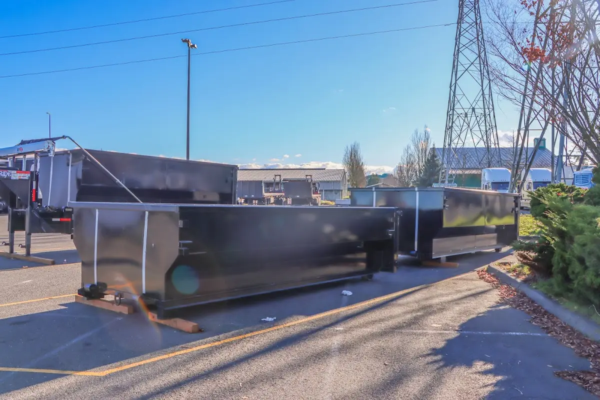Roll-off dumpster ready for waste disposal at job site for 15 Yard Dumpster Rental in Winter Garden